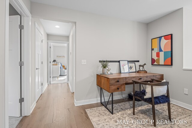 2050 Anderson Dr SE, East Grand Rapids, MI 49506 - home office with wood finished floors, recessed lighting, and baseboards