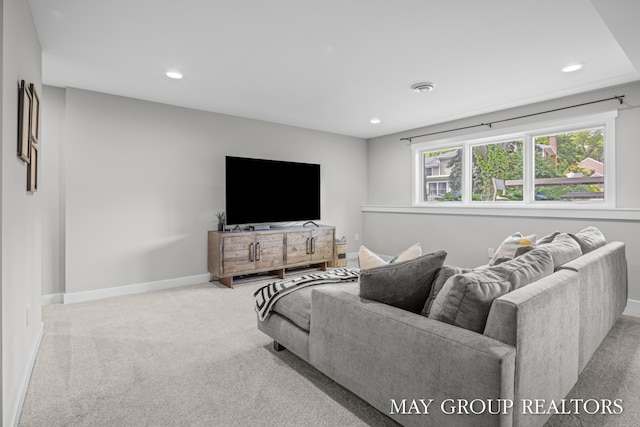 2050 Anderson Dr SE, East Grand Rapids, MI 49506 - carpeted living area with recessed lighting and baseboards