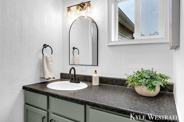 810 James St, Belding, MI 48809 - bathroom with a textured wall and vanity