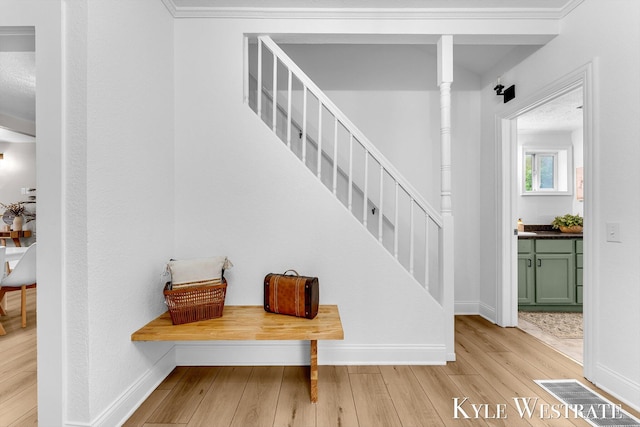 810 James St, Belding, MI 48809 - stairway featuring baseboards and wood finished floors