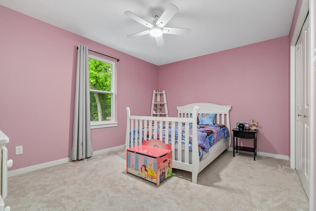 10321 E C Ave, Richland, MI 49083 - carpeted bedroom with a closet, baseboards, and ceiling fan