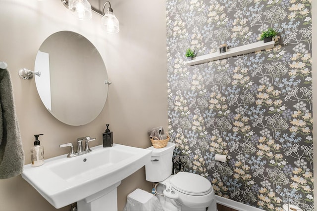 10321 E C Ave, Richland, MI 49083 - half bath with toilet, a sink, and wallpapered walls