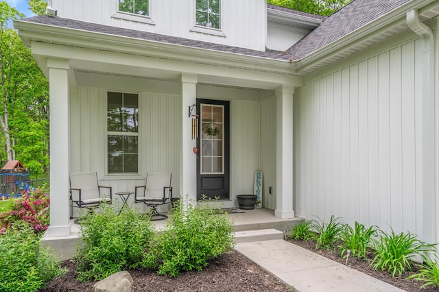 10321 E C Ave, Richland, MI 49083 - view of exterior entry with roof with shingles and covered porch