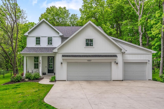 10321 E C Ave, Richland, MI 49083 - modern farmhouse style home with roof with shingles, driveway, a porch, and an attached garage