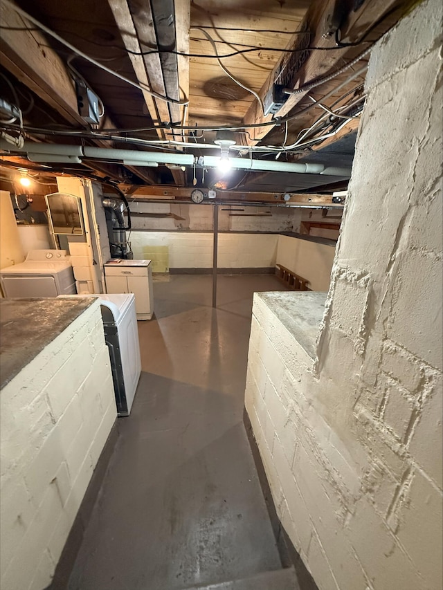 538 Wharton Ave, Ypsilanti, MI 48198 - unfinished basement featuring washing machine and dryer