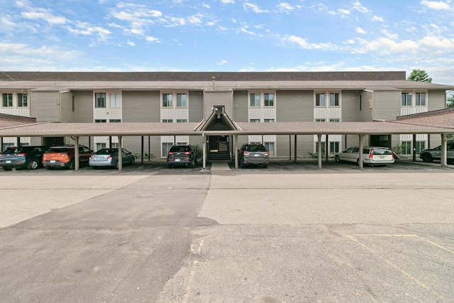 824 Cliffs Dr E Unit 304, Ypsilanti, MI 48198 - view of property with covered parking