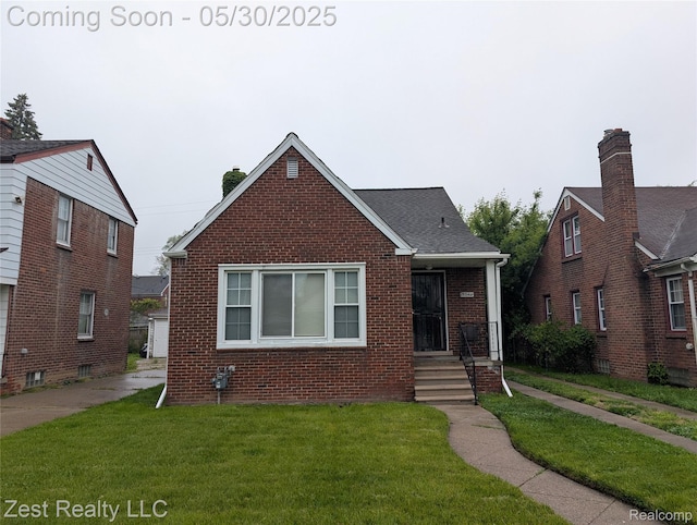 15340 Heyden St, Detroit, MI 48223 - bungalow-style home featuring brick siding, a front yard, and a chimney