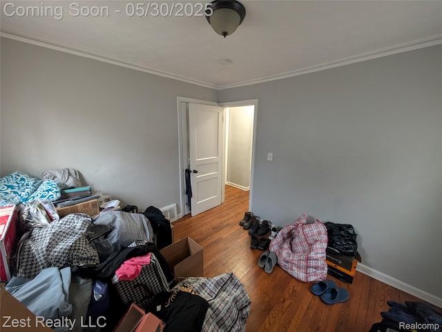 15340 Heyden St, Detroit, MI 48223 - bedroom with ornamental molding, wood finished floors, and baseboards