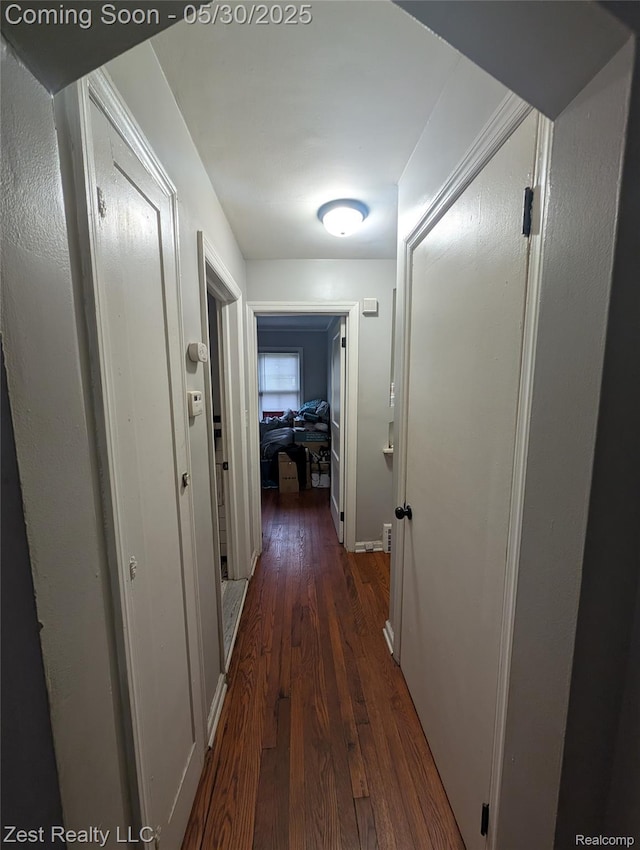 15340 Heyden St, Detroit, MI 48223 - corridor featuring dark wood-type flooring and baseboards