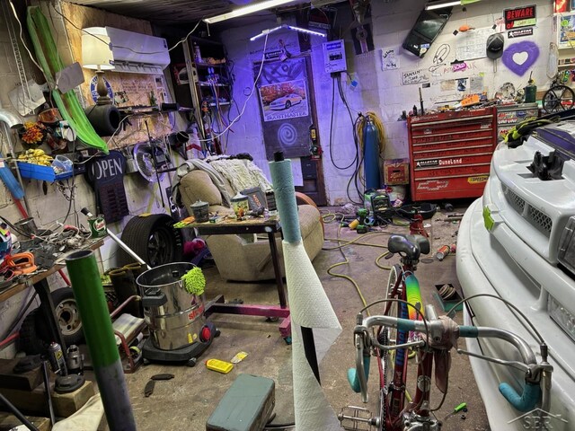 5681 W Fox Rd, Mears, MI 49436 - miscellaneous room featuring a workshop area