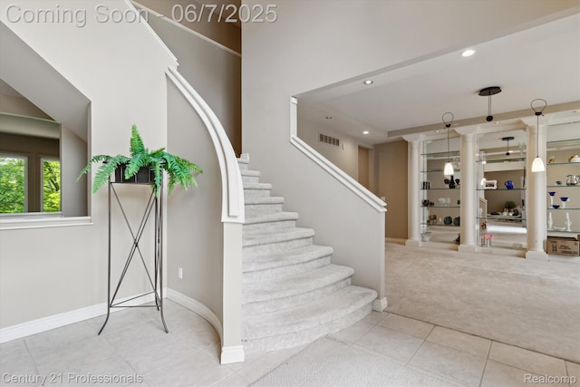 6642 Carlyle Ct, West Bloomfield, MI 48322 - stairway featuring tile patterned floors, recessed lighting, carpet, and baseboards