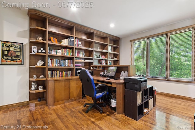 6642 Carlyle Ct, West Bloomfield, MI 48322 - office area featuring wood finished floors and baseboards