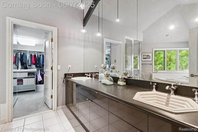 6642 Carlyle Ct, West Bloomfield, MI 48322 - bathroom featuring double vanity, tile patterned flooring, a walk in closet, and high vaulted ceiling