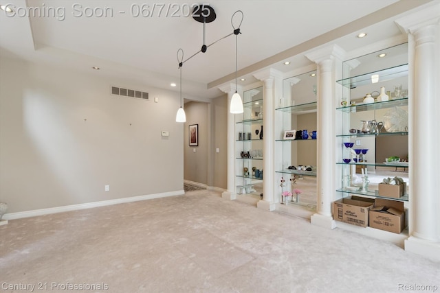 6642 Carlyle Ct, West Bloomfield, MI 48322 - spare room with decorative columns, recessed lighting, light carpet, and baseboards