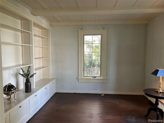 25490 E River Rd, Grosse Ile, MI 48138 - unfurnished room with dark wood-type flooring, beamed ceiling, and baseboards