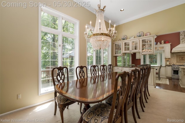 3120 Pond Rd, Leonard, MI 48367 - dining space with a chandelier, plenty of natural light, and crown molding