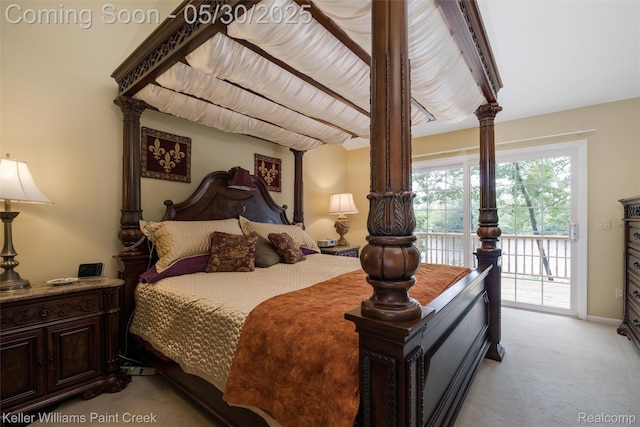 3120 Pond Rd, Leonard, MI 48367 - bedroom featuring access to outside and light carpet