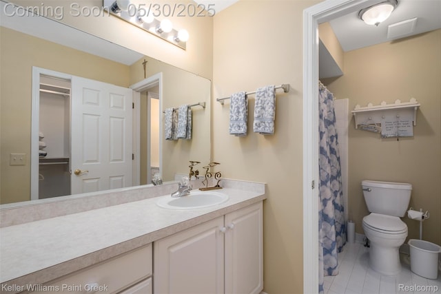 3120 Pond Rd, Leonard, MI 48367 - full bath with vanity, tile patterned flooring, and toilet