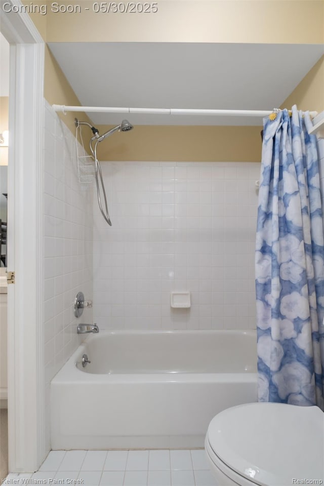3120 Pond Rd, Leonard, MI 48367 - bathroom featuring shower / tub combo, tile patterned flooring, and toilet