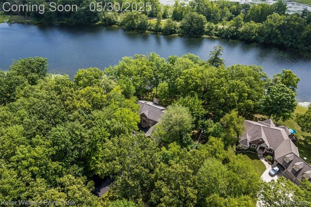 3120 Pond Rd, Leonard, MI 48367 - aerial view of a nearby body of water