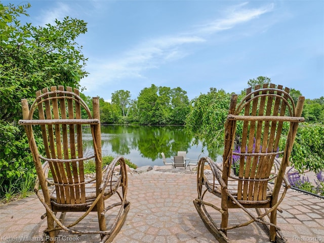 3120 Pond Rd, Leonard, MI 48367 - view of patio / terrace featuring a water view