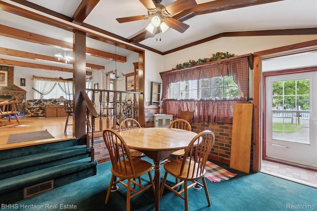 301 N Church St, Byron, MI 48418 - carpeted dining area featuring plenty of natural light, stairway, a ceiling fan, and lofted ceiling