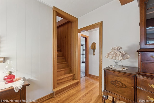 301 N Church St, Byron, MI 48418 - corridor featuring light wood-type flooring and stairs
