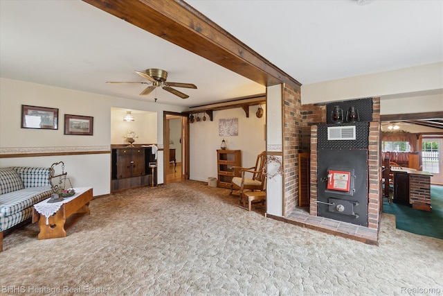 301 N Church St, Byron, MI 48418 - carpeted living room with ceiling fan and a wood stove