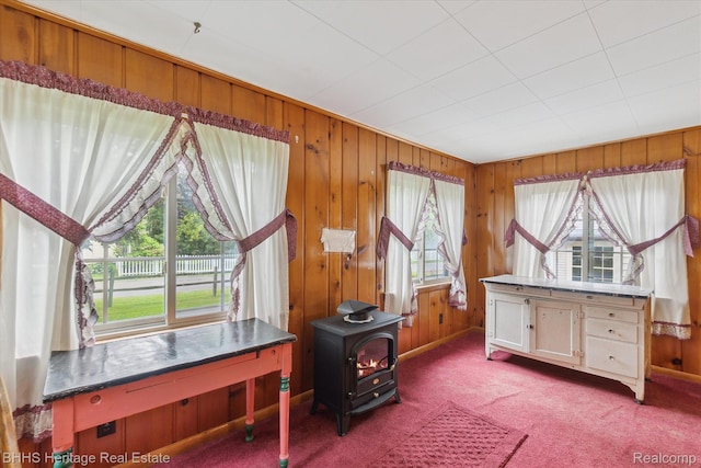 301 N Church St, Byron, MI 48418 - carpeted office with a wood stove and wood walls