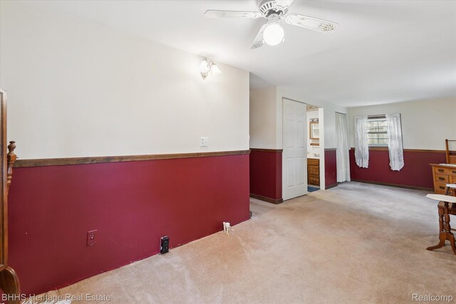 301 N Church St, Byron, MI 48418 - spare room featuring carpet floors and ceiling fan