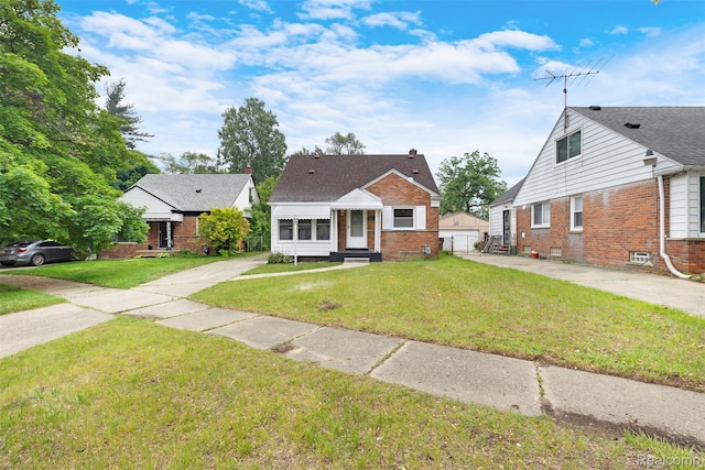 1621 Fairbairn St, Dearborn, MI 48141 - bungalow with brick siding, entry steps, and a gate