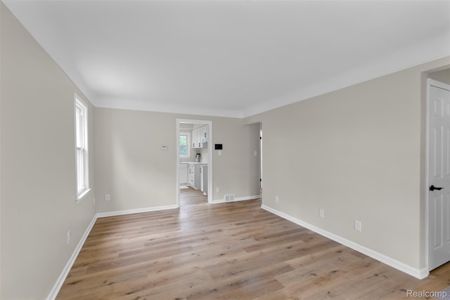 1621 Fairbairn St, Dearborn, MI 48141 - unfurnished room featuring light wood finished floors and baseboards