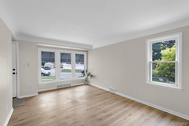 1621 Fairbairn St, Dearborn, MI 48141 - spare room featuring light wood-style floors and baseboards