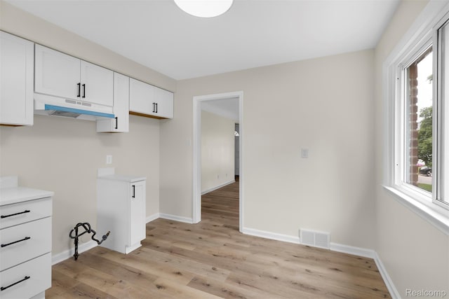 1621 Fairbairn St, Dearborn, MI 48141 - laundry area featuring light wood-style floors