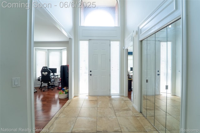54959 Glen Oaks Dr, Shelby Twp, MI 48315 - entrance foyer featuring baseboards and a high ceiling