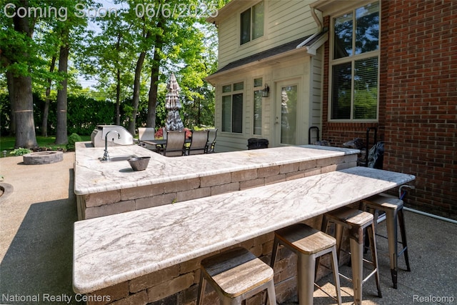 54959 Glen Oaks Dr, Shelby Twp, MI 48315 - view of patio / terrace featuring exterior kitchen