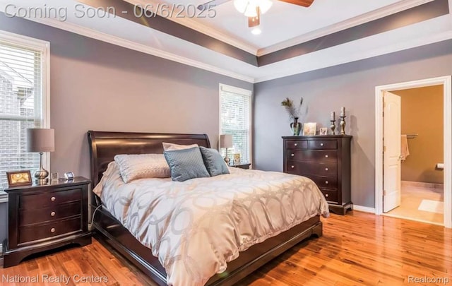 54959 Glen Oaks Dr, Shelby Twp, MI 48315 - bedroom with wood finished floors, multiple windows, crown molding, ensuite bath, and baseboards