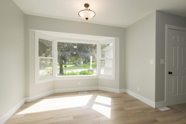 81 Skyline Cir NW, Grand Rapids, MI 49504 - unfurnished room featuring light wood-type flooring and baseboards