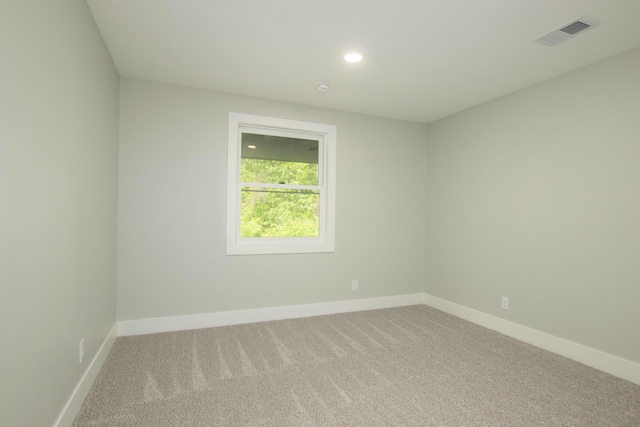 81 Skyline Cir NW, Grand Rapids, MI 49504 - empty room featuring carpet flooring, baseboards, and recessed lighting