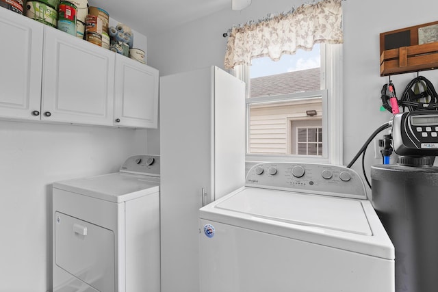 2045 Adams St, Adrian, MI 49221 - washroom featuring cabinet space and washer and dryer