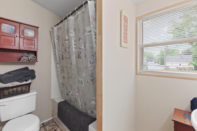 2045 Adams St, Adrian, MI 49221 - full bath featuring toilet, shower / bath combo, vanity, and baseboards