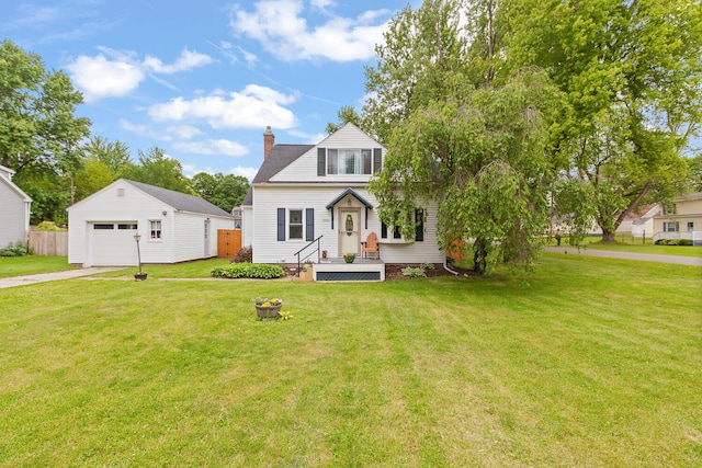 2045 Adams St, Adrian, MI 49221 - bungalow with an outbuilding, a detached garage, a chimney, and driveway