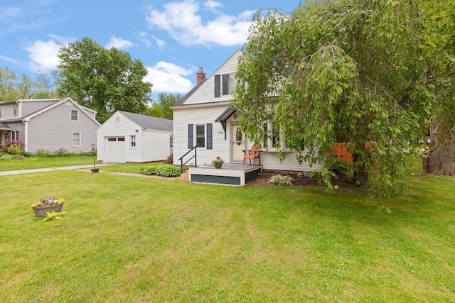 2045 Adams St, Adrian, MI 49221 - view of front of home with an outbuilding, a garage, a front yard, and a chimney