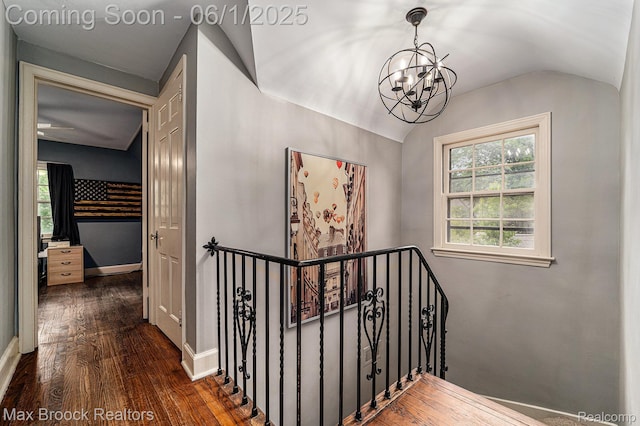1312 Catalpa Dr, Royal Oak, MI 48067 - staircase with vaulted ceiling, a chandelier, wood finished floors, plenty of natural light, and baseboards