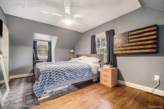 1312 Catalpa Dr, Royal Oak, MI 48067 - bedroom featuring vaulted ceiling, wood finished floors, multiple windows, and baseboards
