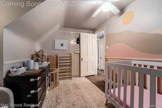 1312 Catalpa Dr, Royal Oak, MI 48067 - bedroom with wood finished floors, vaulted ceiling, a nursery area, and a ceiling fan