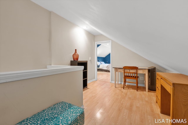 639 College Ave NE, Grand Rapids, MI 49503 - hall featuring lofted ceiling and light wood-style floors