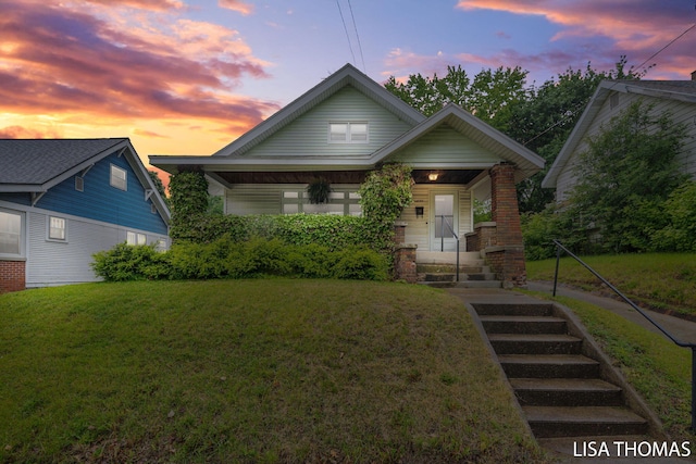 639 College Ave NE, Grand Rapids, MI 49503 - bungalow with a yard and covered porch