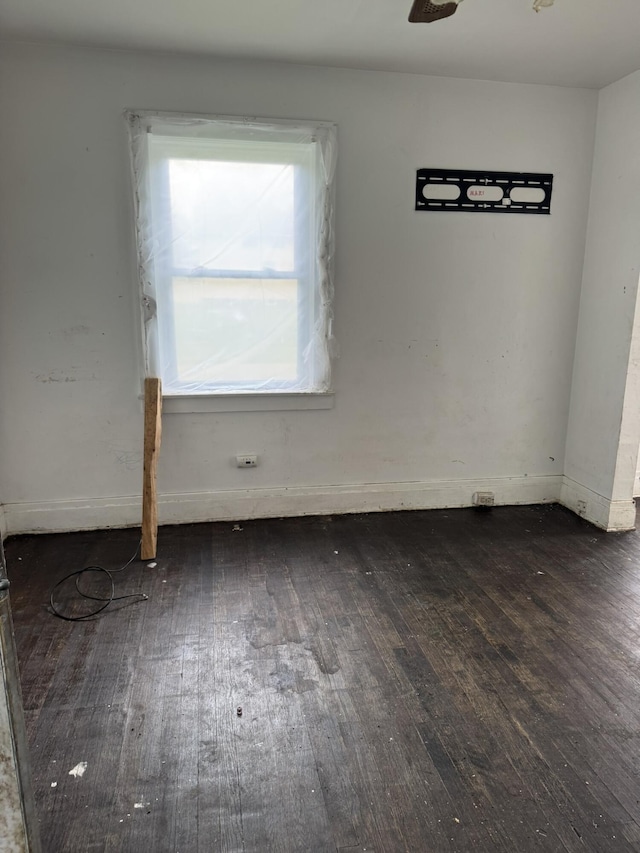 1101 W Rankin St, Flint, MI 48504 - spare room with hardwood / wood-style flooring and baseboards