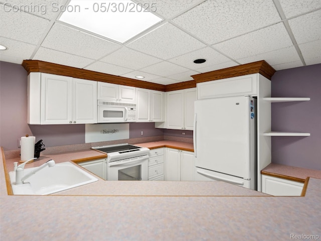 1552 Pebble Creek Dr, Rochester, MI 48307 - kitchen featuring white appliances, a sink, a drop ceiling, white cabinets, and light countertops